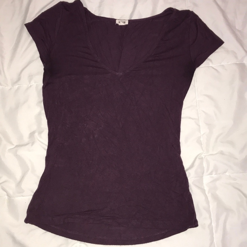 tight purple garage shirt